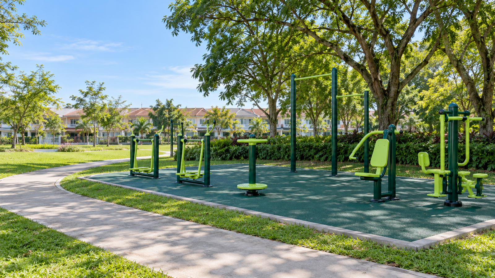 Outdoor gym stations on rubber surfacing in a neighbourhood park with trees and terrace houses